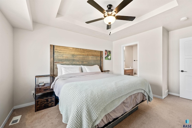 812 Sarah C Cir, Garretson, SD 57030 - bedroom with visible vents, baseboards, and light carpet