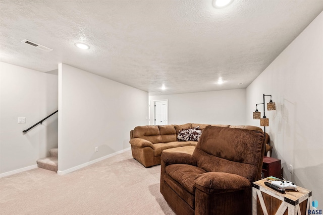 812 Sarah C Cir, Garretson, SD 57030 - living area featuring a textured ceiling, visible vents, baseboards, light colored carpet, and stairs