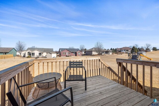 812 Sarah C Cir, Garretson, SD 57030 - deck featuring a residential view