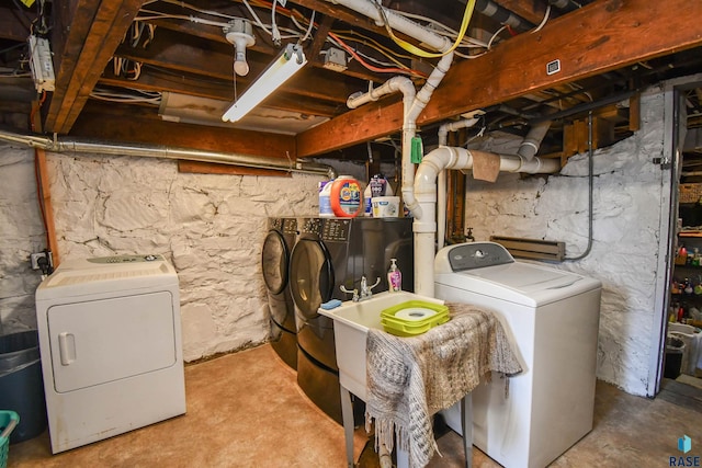 laundry room featuring washing machine and dryer