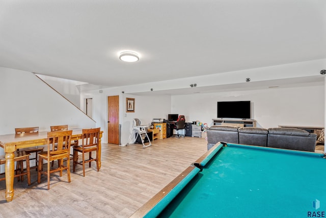 game room featuring light wood-style floors