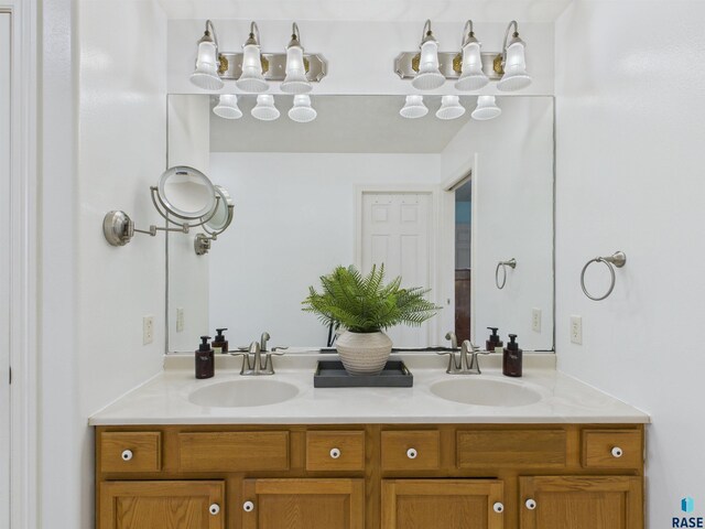 bathroom with double vanity and a sink