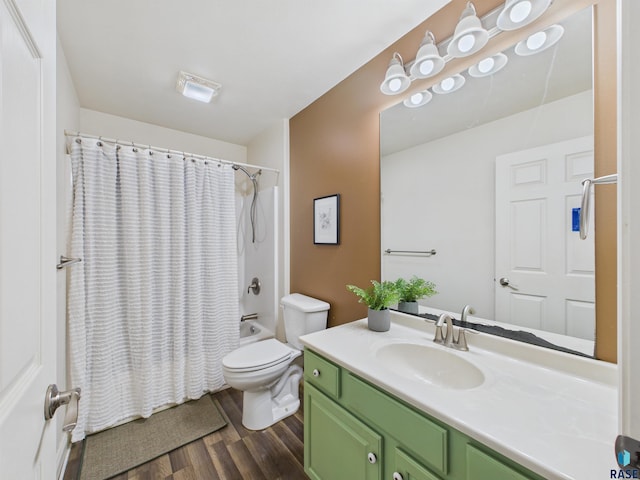 full bathroom featuring toilet, vanity, shower / tub combo with curtain, and wood finished floors
