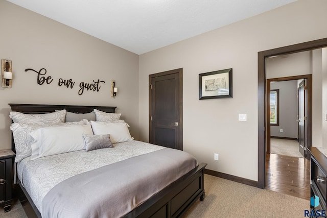 1917 S Firefly Dr, Sioux Falls, SD 57110 - bedroom with light carpet and baseboards