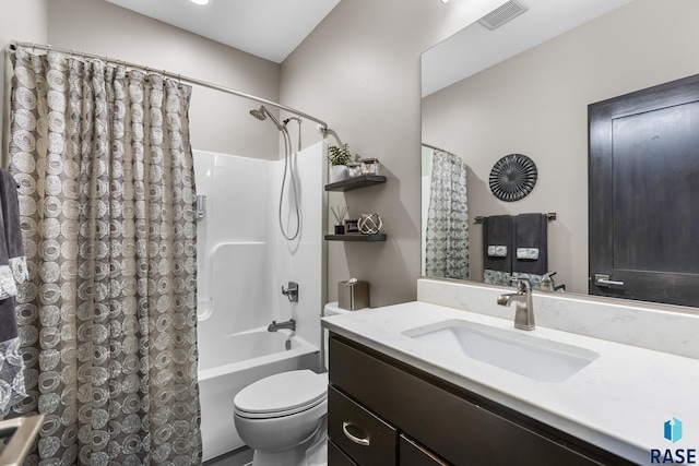 1917 S Firefly Dr, Sioux Falls, SD 57110 - full bath featuring visible vents, shower / tub combo with curtain, toilet, and vanity