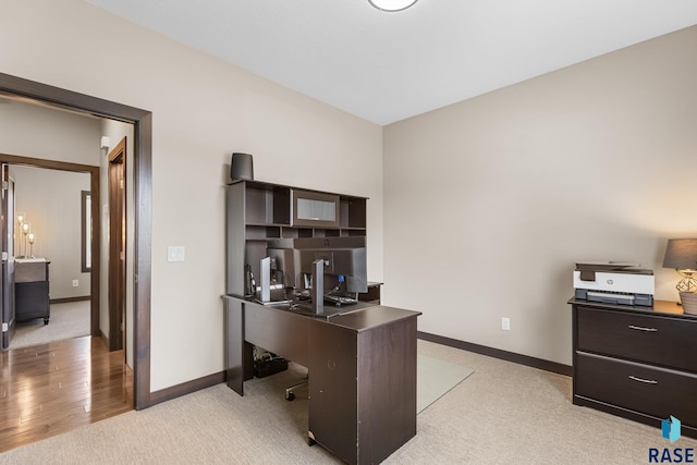 1917 S Firefly Dr, Sioux Falls, SD 57110 - home office with baseboards and light carpet