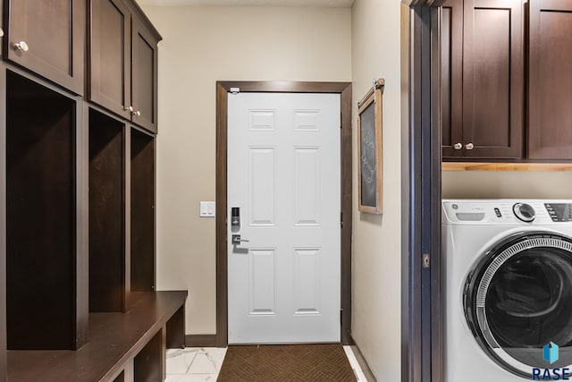 1917 S Firefly Dr, Sioux Falls, SD 57110 - clothes washing area with cabinet space, washer / dryer, and baseboards