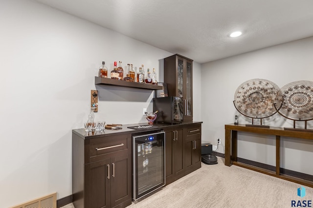 1917 S Firefly Dr, Sioux Falls, SD 57110 - bar featuring recessed lighting, baseboards, visible vents, a bar, and wine cooler