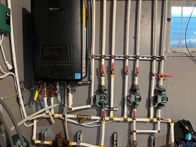 utility room with water heater