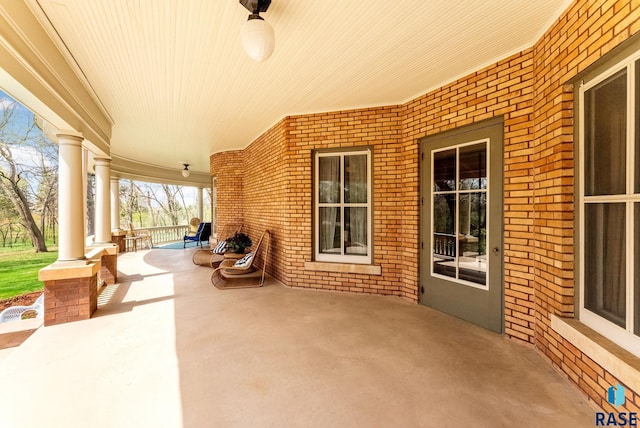 view of patio with covered porch and ceiling fan