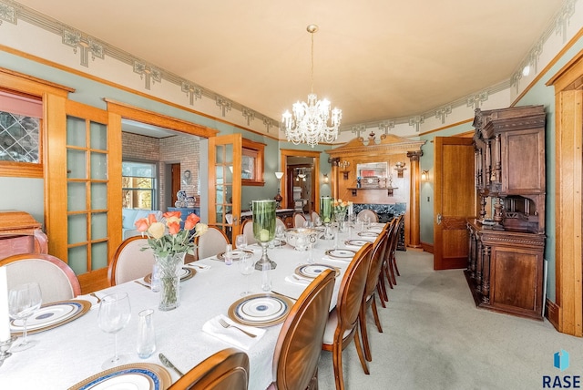 dining area featuring light carpet and a notable chandelier