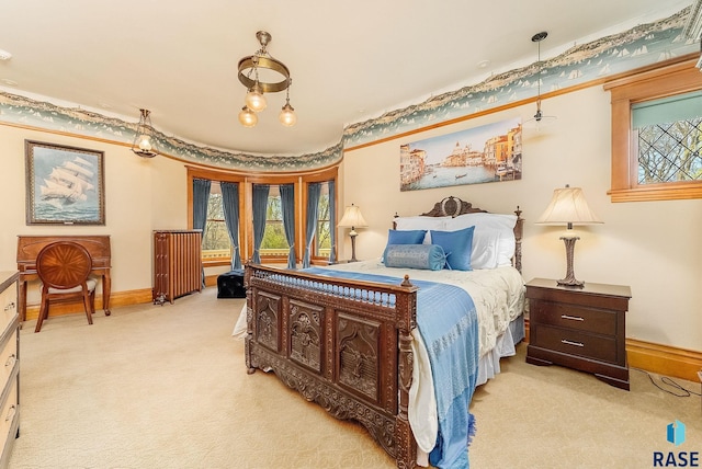bedroom with carpet floors and baseboards