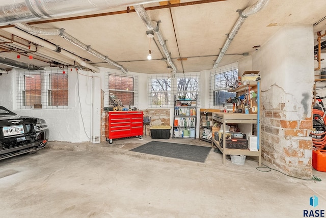 garage with a workshop area
