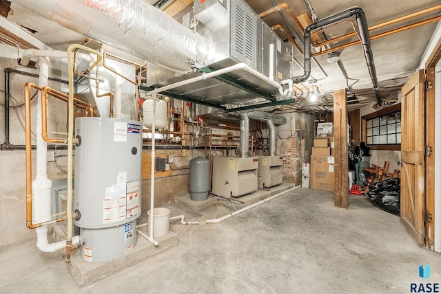 utility room featuring gas water heater