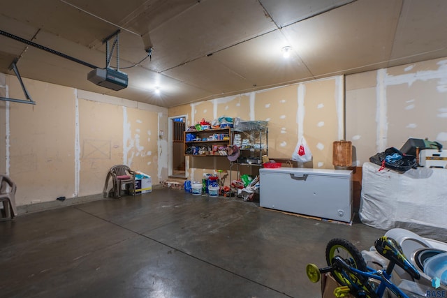 garage featuring a garage door opener