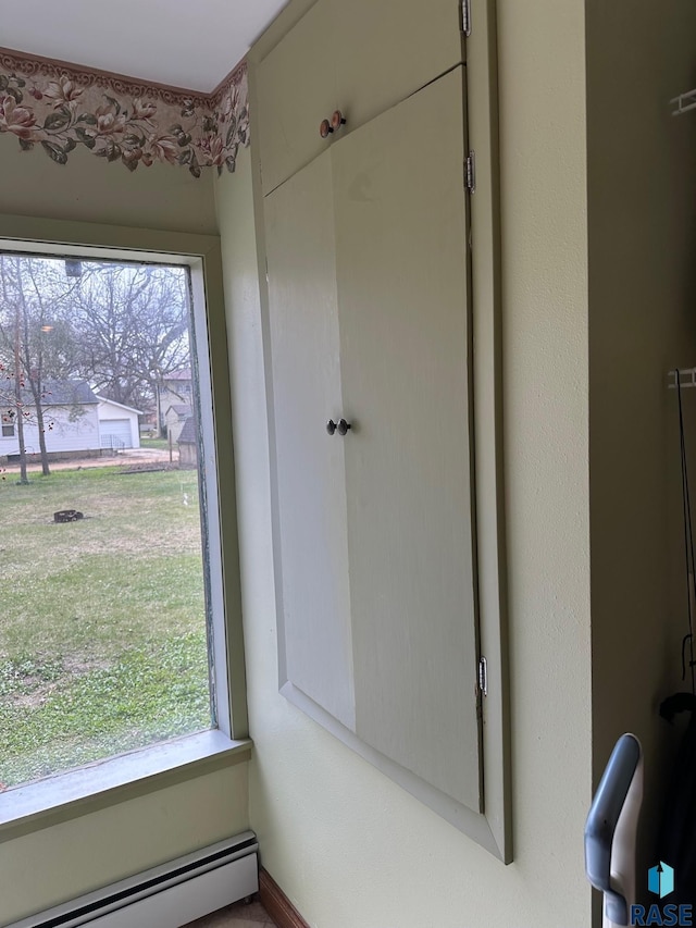 712 6th St, Brookings, SD 57006 - bathroom with a healthy amount of sunlight and a baseboard heating unit