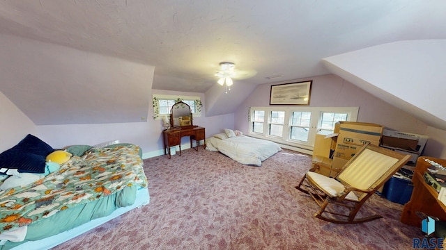712 6th St, Brookings, SD 57006 - carpeted bedroom with ceiling fan and vaulted ceiling