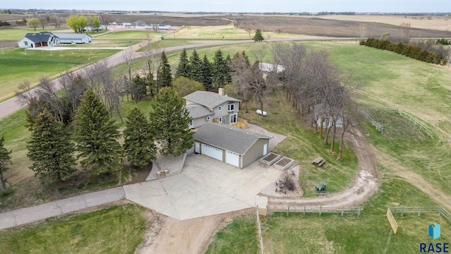 birds eye view of property featuring a rural view