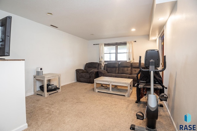 exercise area with baseboards, carpet flooring, visible vents, and recessed lighting