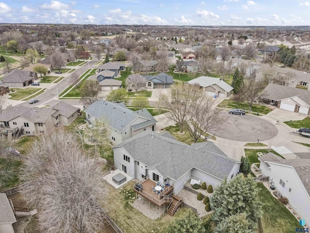 birds eye view of property with a residential view