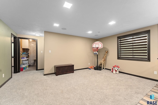 playroom with carpet flooring and baseboards