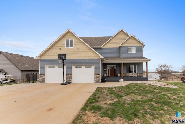 craftsman-style home with driveway, roof with shingles, a porch, and stone siding