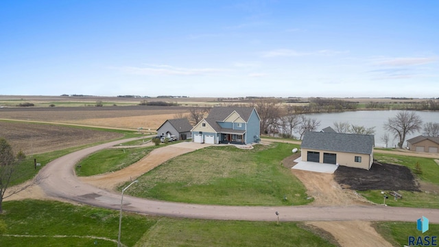 bird's eye view with a rural view and a water view