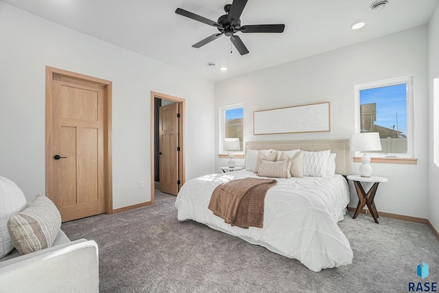 carpeted bedroom featuring ceiling fan, recessed lighting, and baseboards