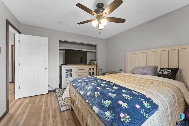 bedroom featuring ceiling fan and light wood finished floors