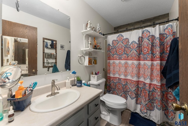 505 E 4th St, Canton, SD 57013 - full bath with a textured ceiling, vanity, toilet, and a shower with curtain