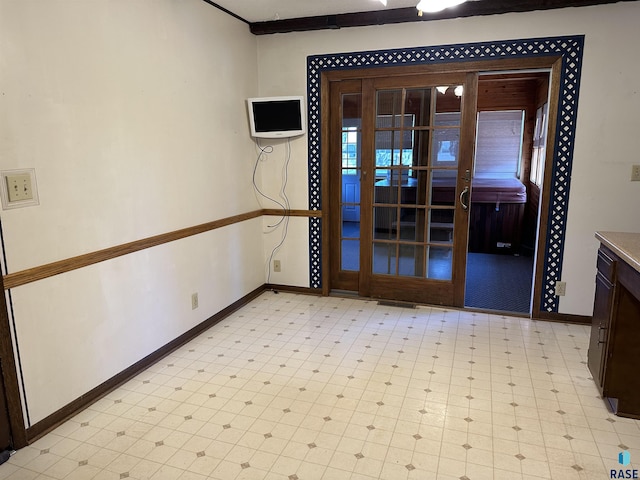 interior space with light floors and baseboards
