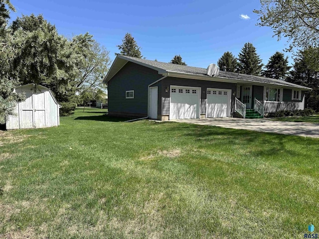 view of side of property featuring covered porch, a storage shed, a lawn, concrete driveway, and an attached garage