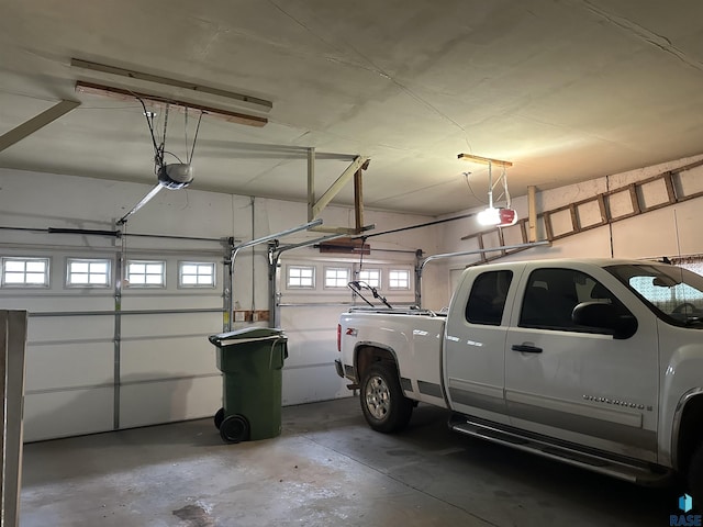 garage featuring a garage door opener