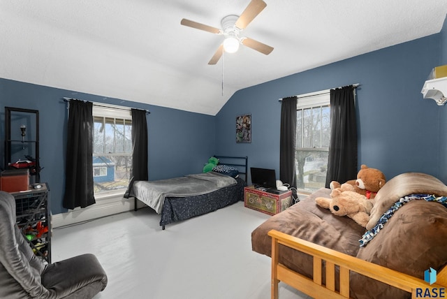 bedroom featuring a ceiling fan, multiple windows, and lofted ceiling