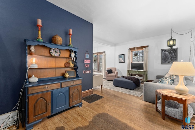 living room with light wood-style floors
