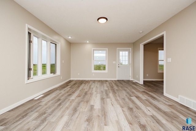 45442 275th St, Parker, SD 57053 - interior space featuring visible vents, light wood finished floors, and baseboards