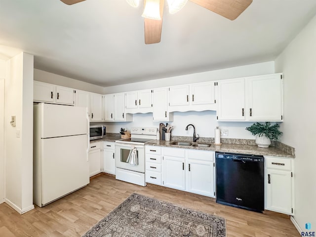 kitchen featuring a sink, ceiling fan, white appliances, and white cabinetry