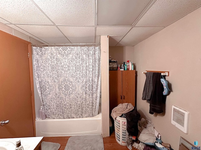 120 SW 2nd St Unit 1 & 2, Wentworth, SD 57075 - full bathroom with shower / bath combo with shower curtain, a paneled ceiling, wood finished floors, and vanity