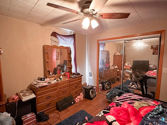 120 SW 2nd St Unit 1 & 2, Wentworth, SD 57075 - bedroom with a ceiling fan and wood finished floors