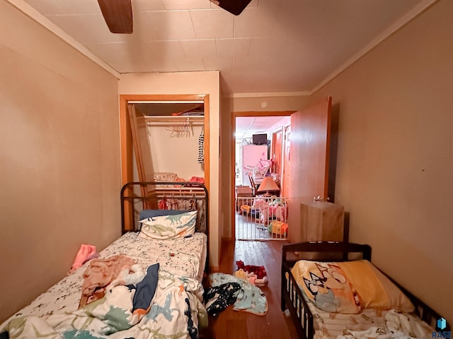 120 SW 2nd St Unit 1 & 2, Wentworth, SD 57075 - bedroom featuring ceiling fan, a closet, and wood finished floors