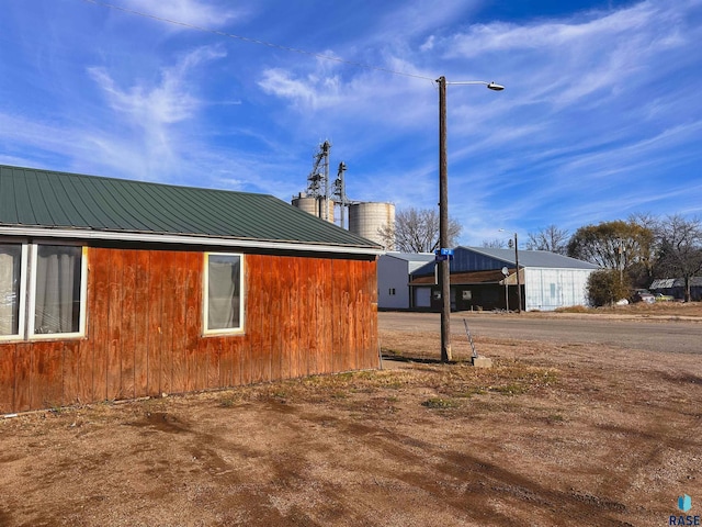 120 SW 2nd St Unit 1 & 2, Wentworth, SD 57075 - view of property exterior featuring metal roof