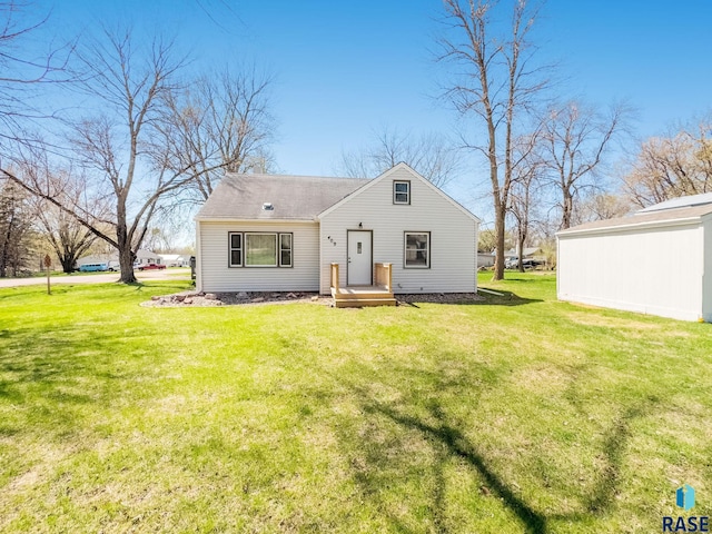 409 Boxelder St, Valley Springs, SD 57068 - view of front facade with a front lawn