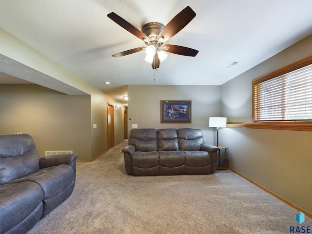 301 W Hackberry St, Brandon, SD 57005 - carpeted living room with visible vents, baseboards, and ceiling fan