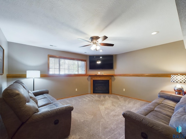301 W Hackberry St, Brandon, SD 57005 - living area with carpet flooring, a fireplace, a ceiling fan, baseboards, and visible vents
