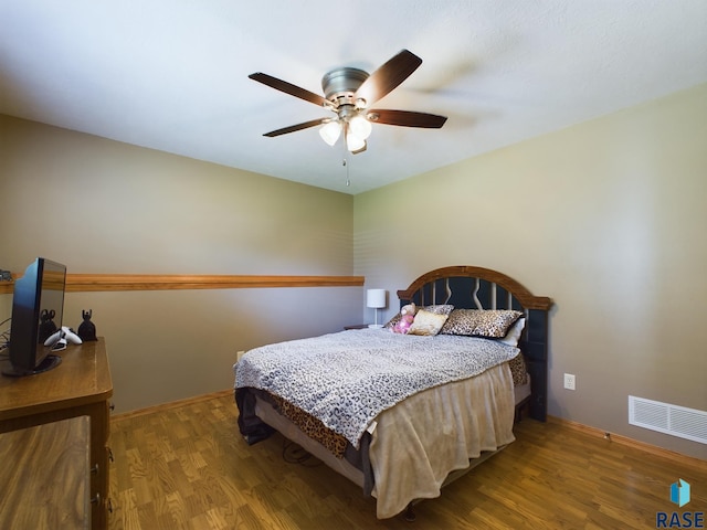 301 W Hackberry St, Brandon, SD 57005 - bedroom with a ceiling fan, baseboards, visible vents, and wood finished floors