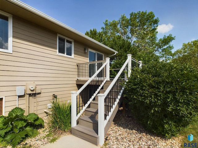 301 W Hackberry St, Brandon, SD 57005 - doorway to property with a wooden deck