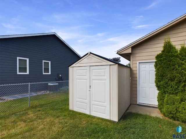 301 W Hackberry St, Brandon, SD 57005 - view of shed featuring fence