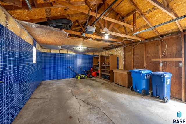 garage featuring a garage door opener