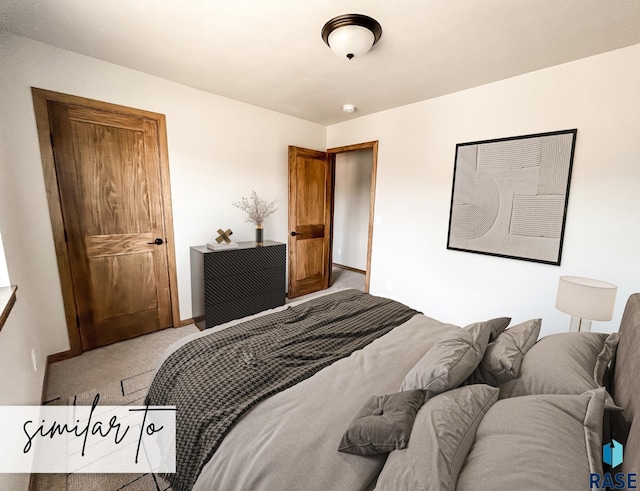 5705 E Avett Pl, Sioux Falls, SD 57108 - bedroom with baseboards and carpet