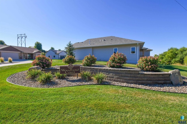 view of yard featuring a garage